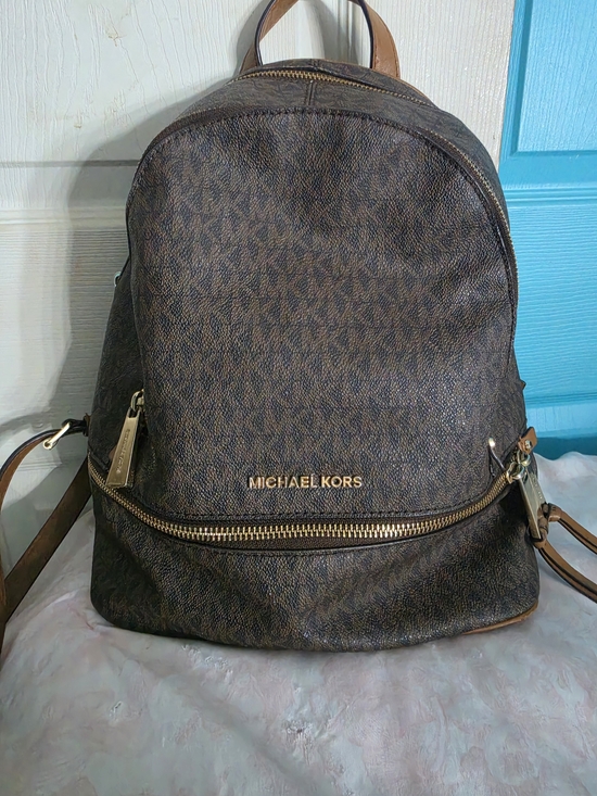 Michael Kors Handbags - Michael Kors Brown Logo-Print Backpack with Gold Hardware